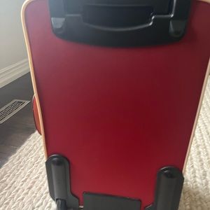 Authentic Coach red and leather suitcase